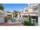 Backyard showcasing a pool, patio area, and manicured landscaping on a sunny day at 2107 Inverness Dr, Henderson, NV 89074