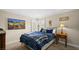 Comfortable bedroom with a queen-size bed, and bedside lamps at 2107 Inverness Dr, Henderson, NV 89074