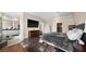 Spacious main bedroom with dark wood floors leading to a spa-like ensuite bathroom at 2107 Inverness Dr, Henderson, NV 89074