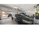 Spacious garage with multiple vehicles parked inside, including a black sports car at 2107 Inverness Dr, Henderson, NV 89074