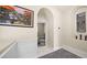 Bright hallway with access to bedroom and decorative wall niche at 2107 Inverness Dr, Henderson, NV 89074