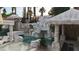 Luxury pool area with a waterfall and multiple gazebos at 2107 Inverness Dr, Henderson, NV 89074