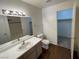 Clean bathroom with vanity, toilet, bathtub and linen closet at 2120 Ramrod Ave # 1721, Henderson, NV 89014