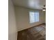 Bright bedroom with carpeted floor, ceiling fan and window coverings at 2120 Ramrod Ave # 1721, Henderson, NV 89014