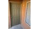 Exterior view of condo's front door and window at 2120 Ramrod Ave # 1721, Henderson, NV 89014