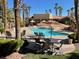 Inviting community pool with lounge chairs at 2120 Ramrod Ave # 1721, Henderson, NV 89014