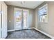 Bedroom with neutral walls, carpet, double french doors and bright windows to allow natural light at 217 Via Luna Rosa Ct, Henderson, NV 89011