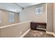 Loft area with a built-in desk, neutral walls, neutral carpet, and natural light at 217 Via Luna Rosa Ct, Henderson, NV 89011