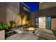 Modern backyard with fire pit and water feature at 2272 Horizon Light Ct, Henderson, NV 89052