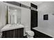 Bathroom with dark tile and white quartz countertop at 2272 Horizon Light Ct, Henderson, NV 89052