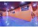 Finished garage with blue epoxy floor and car detailing at 2272 Horizon Light Ct, Henderson, NV 89052