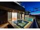 Relax in this hot tub with city views at night at 2272 Horizon Light Ct, Henderson, NV 89052