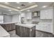 Modern kitchen with stainless steel appliances and large island at 2272 Horizon Light Ct, Henderson, NV 89052