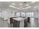 Modern kitchen with large island and stainless steel appliances at 2272 Horizon Light Ct, Henderson, NV 89052