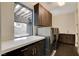 Bright laundry room with modern appliances and cabinets at 2272 Horizon Light Ct, Henderson, NV 89052