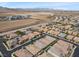 Aerial view of neighborhood with houses, streets and desert landscape at 2364 Boretto St, Henderson, NV 89044