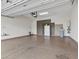 Clean and spacious garage with epoxy flooring and utility sink at 2364 Boretto St, Henderson, NV 89044