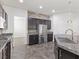 Modern kitchen with stainless steel appliances and granite countertops at 2364 Boretto St, Henderson, NV 89044