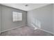 Well-lit bedroom with carpet and neutral walls at 2526 Rocky Countryside St, North Las Vegas, NV 89030