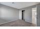 Bright bedroom featuring a closet and access to another room at 2526 Rocky Countryside St, North Las Vegas, NV 89030