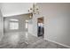 Open dining area with kitchen access and tiled floors at 2526 Rocky Countryside St, North Las Vegas, NV 89030