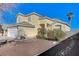 Two-story house with attached garage and desert landscaping at 2526 Rocky Countryside St, North Las Vegas, NV 89030