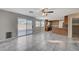 Gathering room with tile floors and sliding glass doors to backyard at 2526 Rocky Countryside St, North Las Vegas, NV 89030