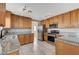 Updated kitchen featuring stainless steel appliances and granite countertops at 2526 Rocky Countryside St, North Las Vegas, NV 89030