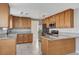 Spacious kitchen with an island, granite countertops, and stainless steel appliances at 2526 Rocky Countryside St, North Las Vegas, NV 89030