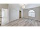 Bedroom with sliding door closet and wood-look floors at 2633 S Durango Dr # 201, Las Vegas, NV 89117