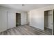 Bedroom with large closet and wood-look floors at 2633 S Durango Dr # 201, Las Vegas, NV 89117