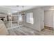 Bright dining room features hardwood floors and mirrored accent wall at 2633 S Durango Dr # 201, Las Vegas, NV 89117