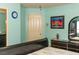 This bright bedroom features light turquoise walls, art, and a black dresser with plenty of storage at 3008 Blue Fin Cir, Las Vegas, NV 89128