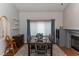 Bright dining room with hardwood floors and a fireplace at 3008 Blue Fin Cir, Las Vegas, NV 89128