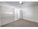 Bright bedroom with sliding closet doors and neutral carpeting at 3012 Holly Hill Ave, Las Vegas, NV 89104