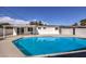 Inviting backyard oasis featuring a sparkling blue pool at 3012 Holly Hill Ave, Las Vegas, NV 89104