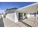 Backyard pool area with covered patio and gate at 3012 Holly Hill Ave, Las Vegas, NV 89104