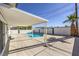 Inviting pool with a covered patio and palm tree in the backyard at 3012 Holly Hill Ave, Las Vegas, NV 89104