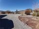 Gravel backyard with storage shed at 3381 W Simkins Rd, Pahrump, NV 89060