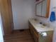 Clean bathroom with double vanity and large mirror at 3381 W Simkins Rd, Pahrump, NV 89060