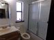 Bathroom with shower/tub combo and single vanity at 3381 W Simkins Rd, Pahrump, NV 89060