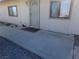 Home exterior featuring a concrete patio at 3381 W Simkins Rd, Pahrump, NV 89060