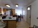 Kitchen, dining area, and entryway with tile flooring at 3381 W Simkins Rd, Pahrump, NV 89060