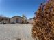 Small outbuilding in a rural location with a standard door and a simple design at 3381 W Simkins Rd, Pahrump, NV 89060