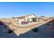 Backyard patio with seating area, shed, and landscaping at 3811 E Chaffe Ave, Pahrump, NV 89061