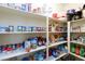 Well-stocked pantry with ample shelving for storage at 3811 E Chaffe Ave, Pahrump, NV 89061