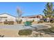 Green park bench in a landscaped community area at 3811 E Chaffe Ave, Pahrump, NV 89061