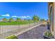 Brick patio and golf course views beyond the fence at 4390 E Cactus Canyon Dr, Pahrump, NV 89061