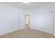 Spacious bedroom with neutral walls, carpet, and double doors at 4435 Lavender Ln, Pahrump, NV 89061