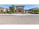 Community center entrance with inviting landscaping and stonework at 4435 Lavender Ln, Pahrump, NV 89061